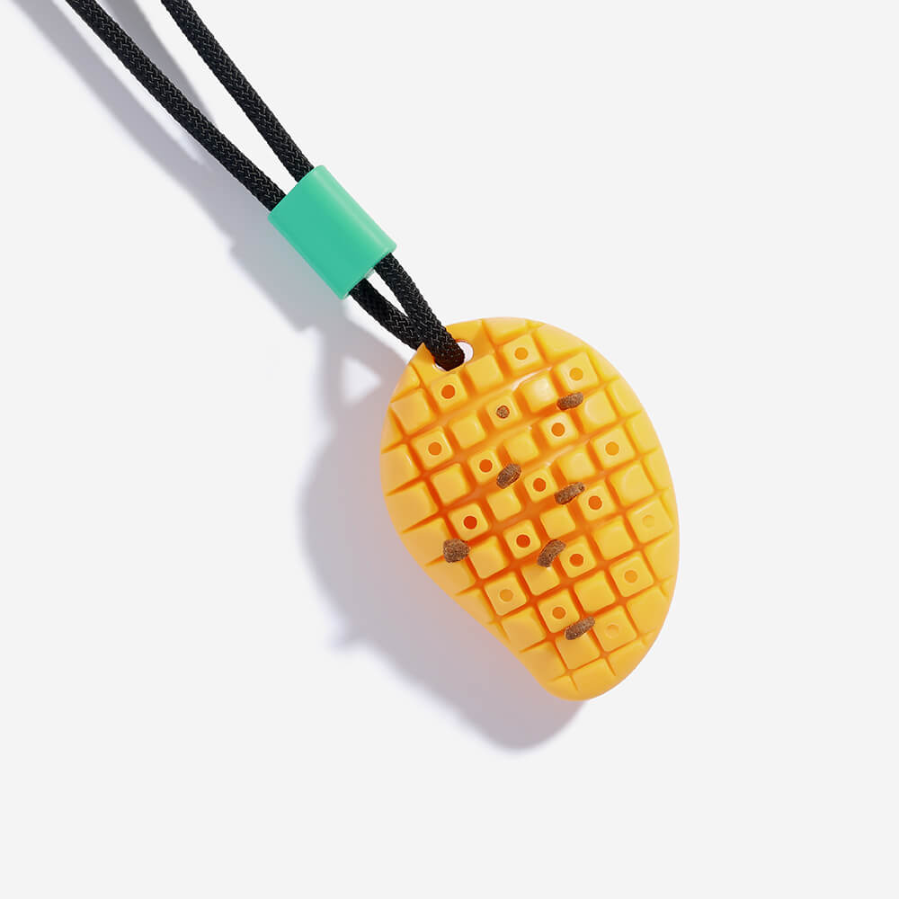 Durable TPR dog toy with textured ball and suction cup for engaging play and dental hygiene.