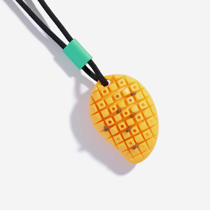 Durable TPR dog toy with textured ball and suction cup for engaging play and dental hygiene.