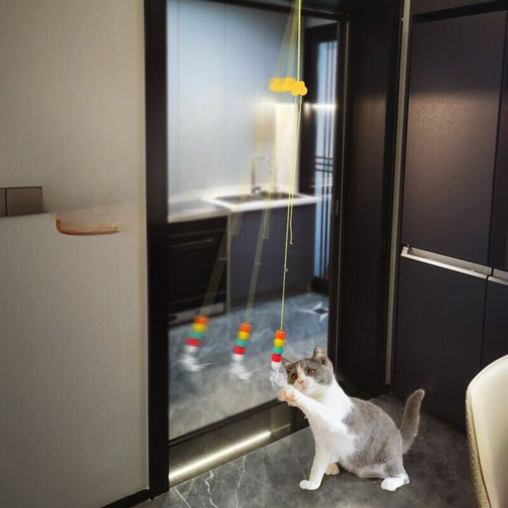 Suspended bell cat toy for interactive play, promoting feline activity and fun.