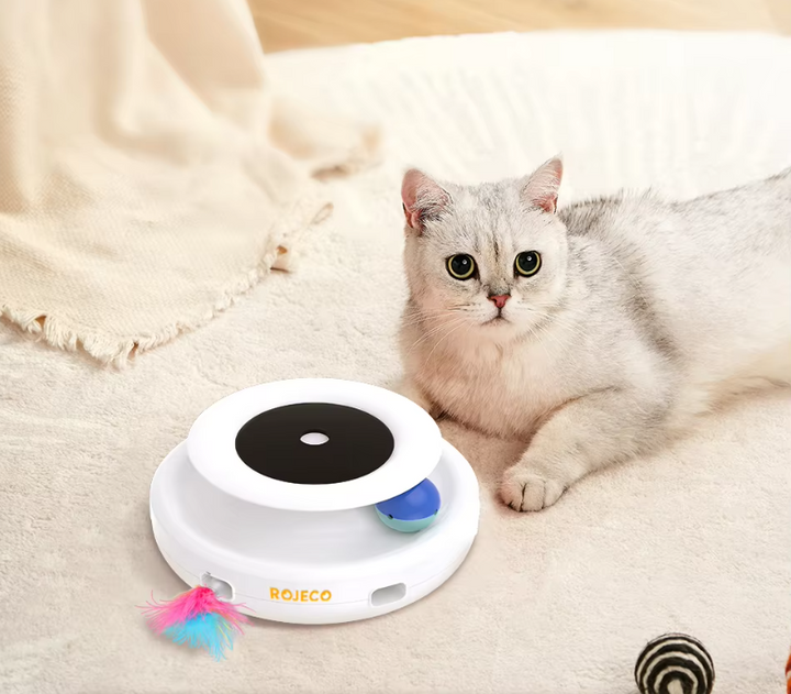 White interactive cat exercise toy with feather and entertaining LED light