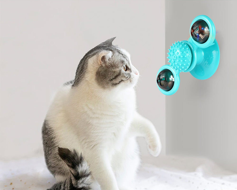 Colorful interactive windmill cat toy with strong suction cup for secure attachment, enhancing playtime.