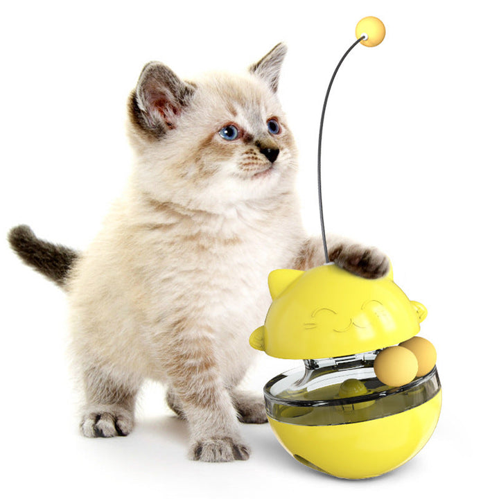 Orange interactive cat toy, wobbles to dispense treats, great for kittens and cat enrichment.