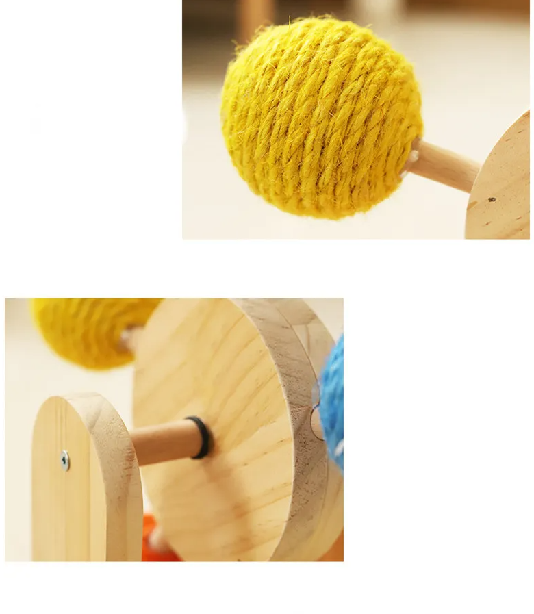 Close-up of cat paw on sisal scratching board of interactive ferris wheel cat toy
