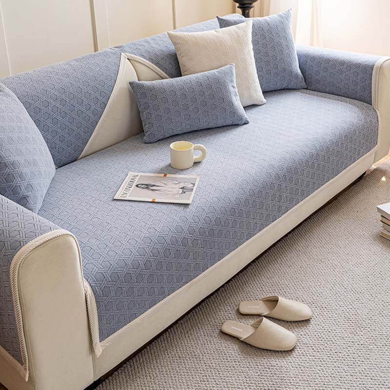 Jacquard chenille couch cover in a neutral hue, water repellent, pet friendly furniture protection.