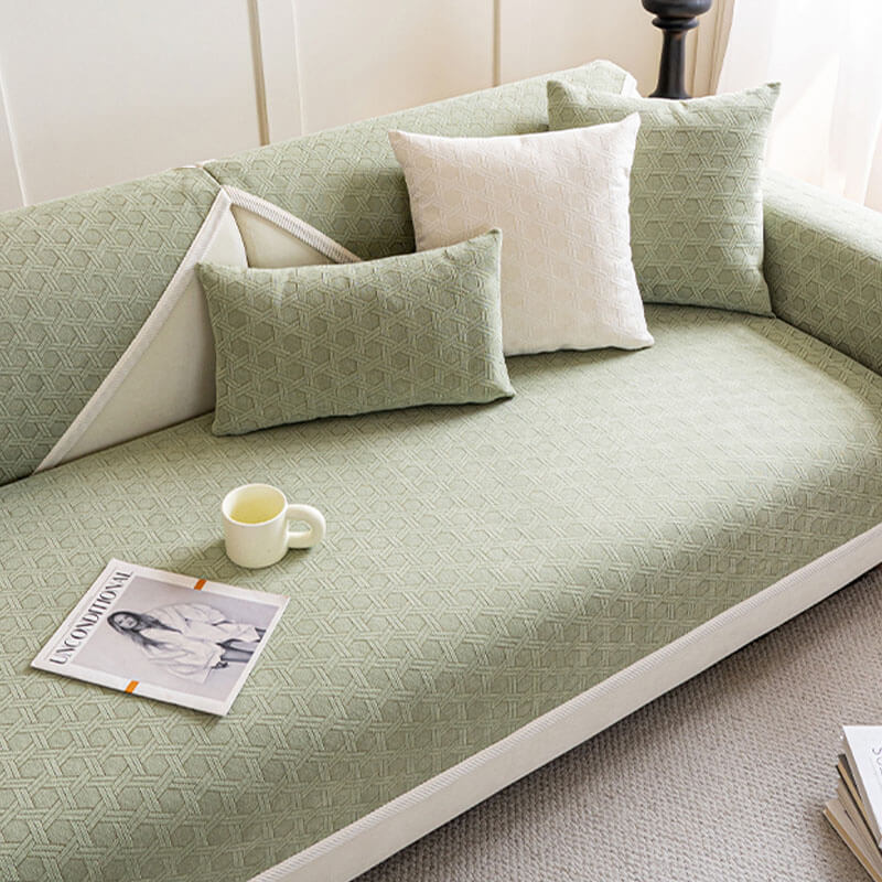 Luxurious jacquard chenille sectional cover, water repellent, pet friendly, easy-care.