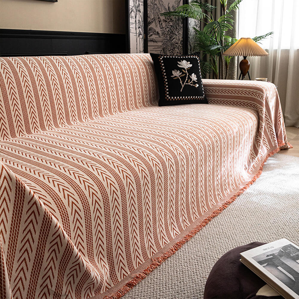 Jacquard tassel chenille couch cover in a cozy living room setting, elegant sofa protector