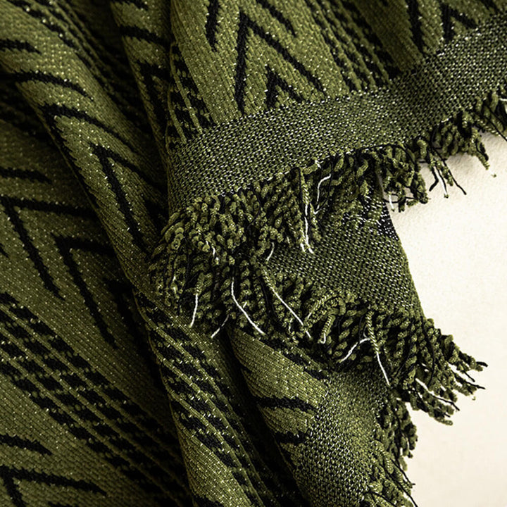 Luxurious jacquard chenille couch cover with tassels, ideal for elegant home decor and protection