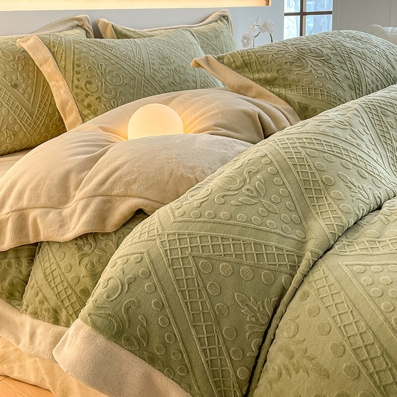 Detail shot of the jacquard pattern on a warm velvet sheet, highlighting its quality.