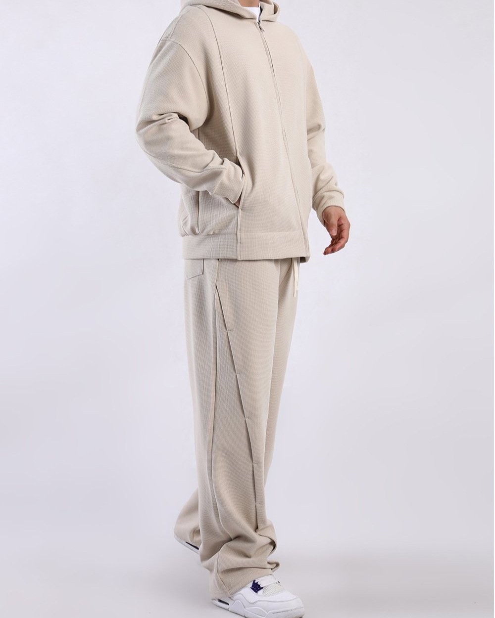 Close-up of men's Lucca relaxed fit waffle texture sweatpants with drawstring waist.
