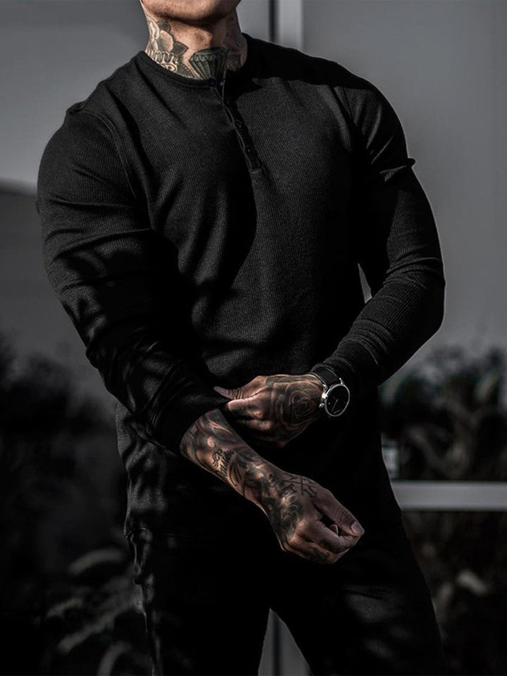 Layerable men's long sleeve ribbed henley, perfect for fall and winter wear.