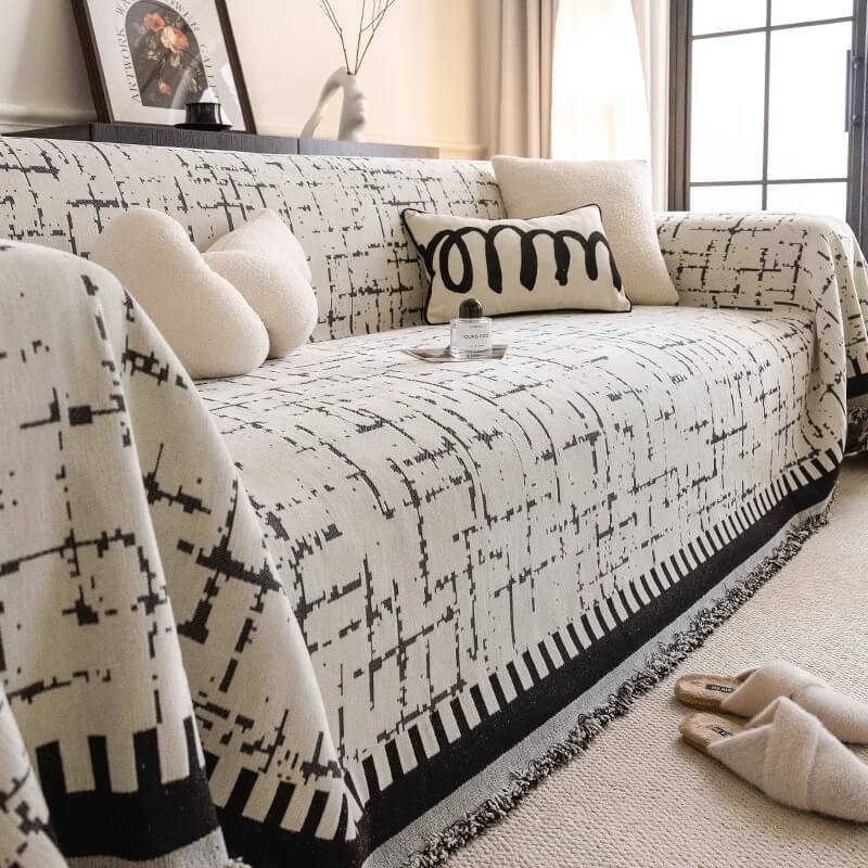 Soft, breathable chenille throw couch cover in neutral tone, ideal for all-season use