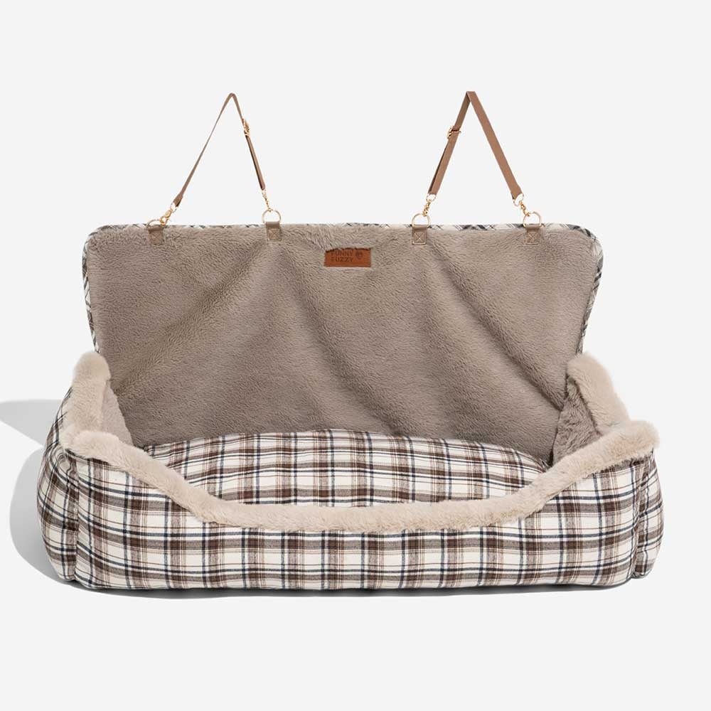 Comfortable khaki dog booster car seat with secure attachments for pet travel.