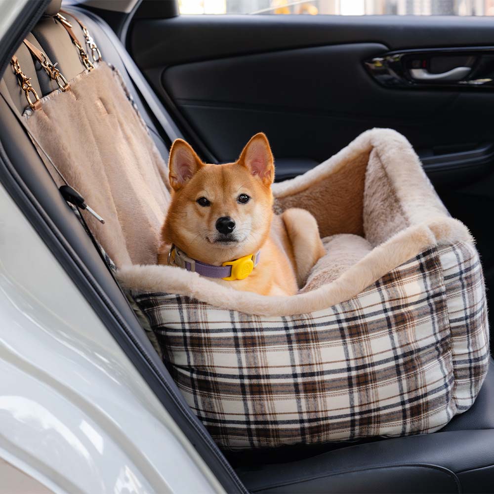 Grey fluffy pet booster car seat, ensuring dog safety and comfort during travel.
