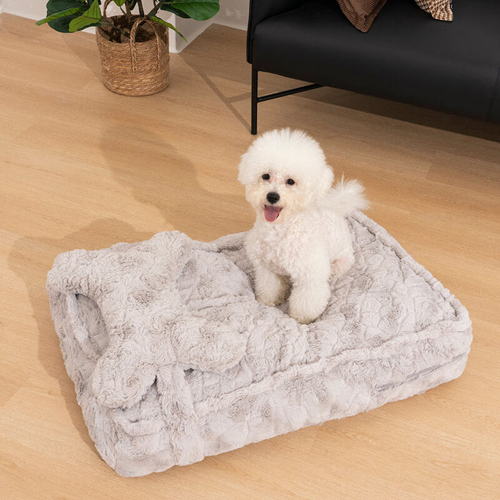 Softest khaki cloud dog bed with a matching bone pillow, ideal for calming and warmth, washable.