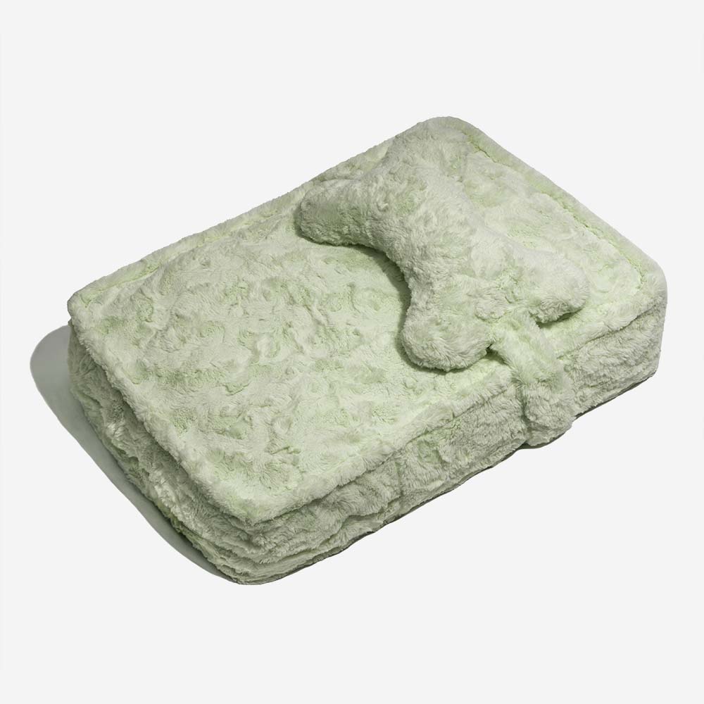 Plush grey pet bed, bone-shaped cushion, warming and fluffy, designed for ultimate pet comfort.