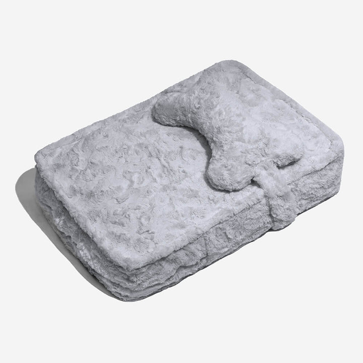 Khaki unisex pet bed, bone pillow, cloud texture, provides warmth and a calming sleep environment.