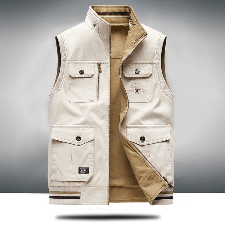 Functional multi-pocket utility vest in khaki, unisex design, structured for practical outdoor layering.