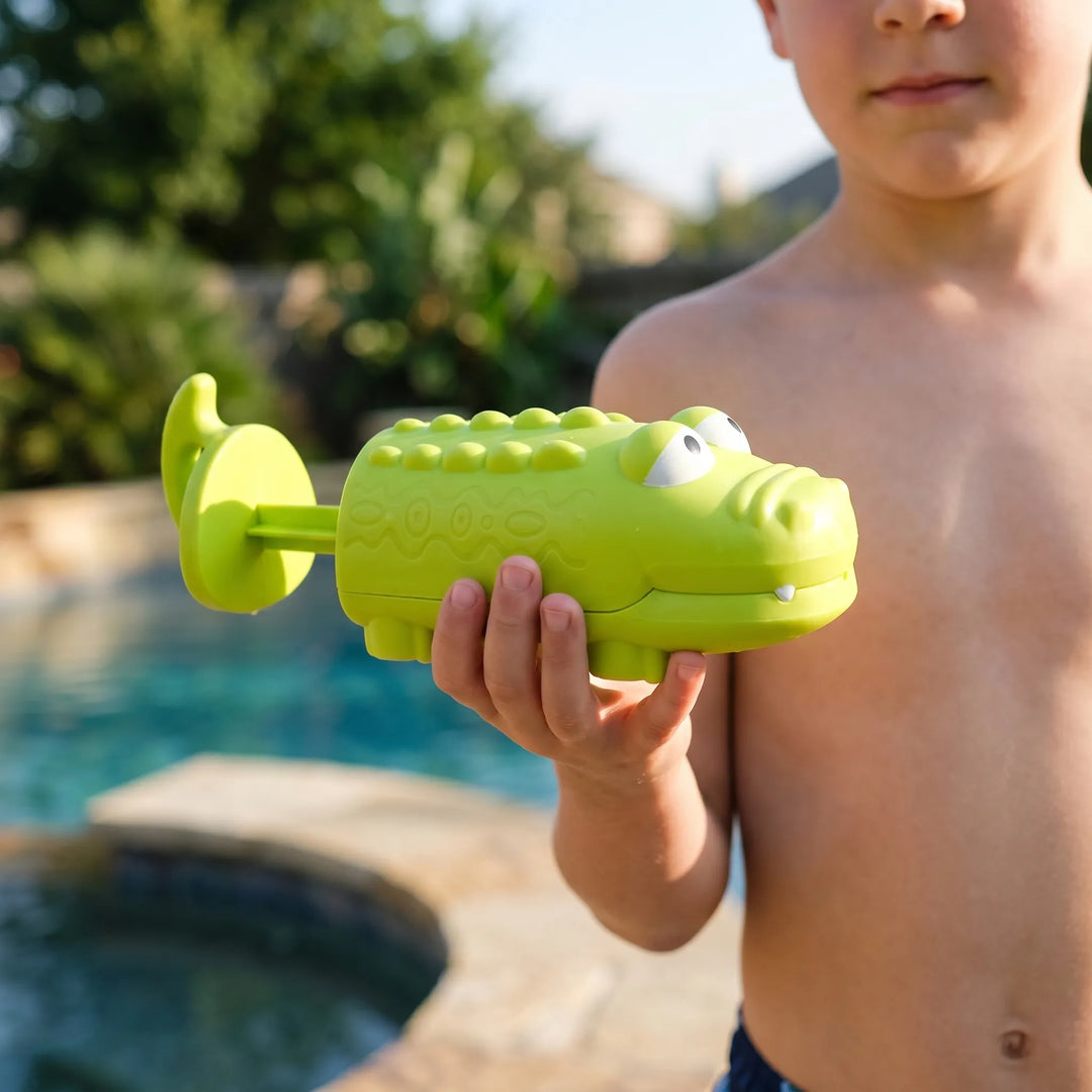 Cute animal water squirt toy for kids, ideal for bath time or pool adventures.