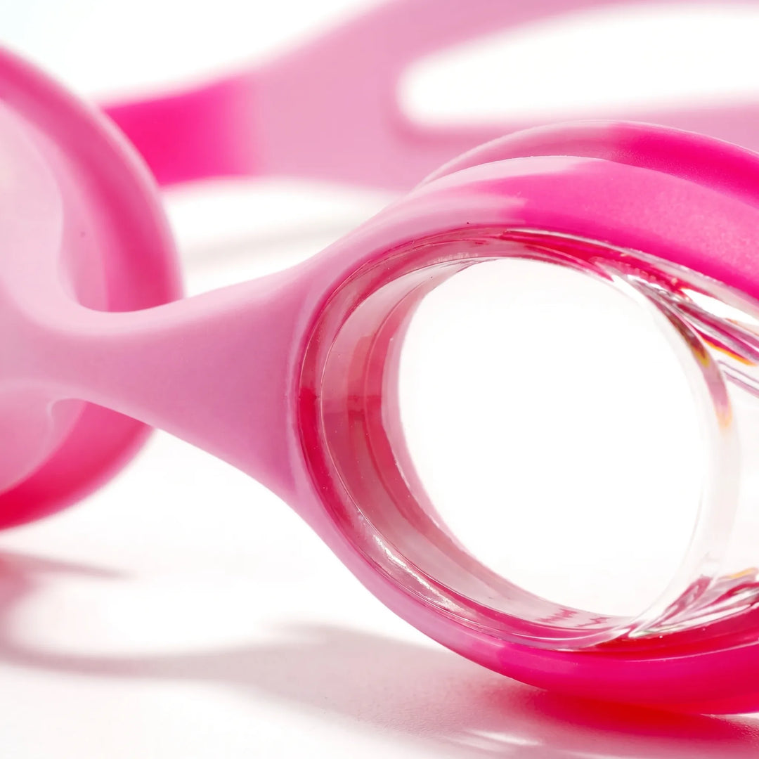 Anti-fog kids' swim goggles ensure clear vision in the pool. Adjustable strap for a secure, comfortable fit.