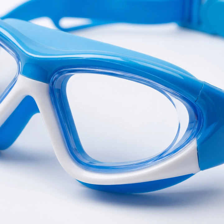 Anti-fog kids' swim goggles with UV protection, ensuring clear vision for young swimmers. Includes integrated earplugs.
