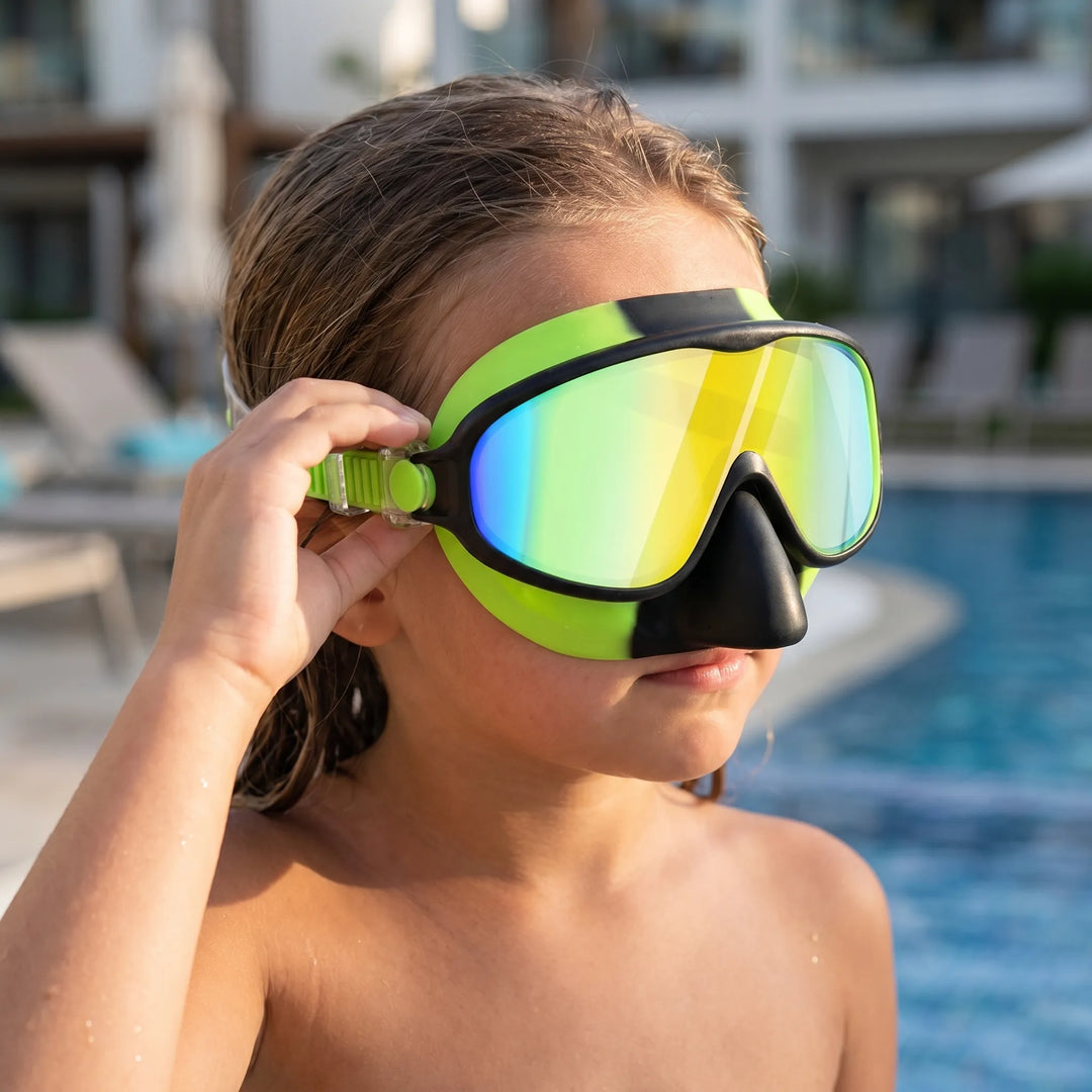 Kids anti-leak swim mask with integrated nose cover for comfortable, wide-view underwater exploration.