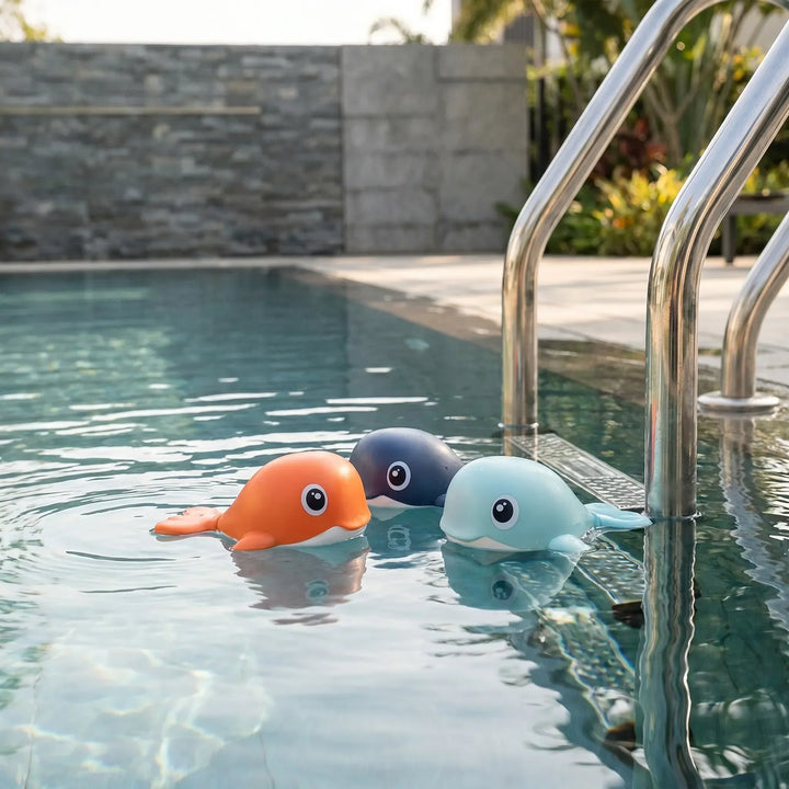 Kids' battery-free wind-up floating whale bath toy set for toddlers. Fun water play.