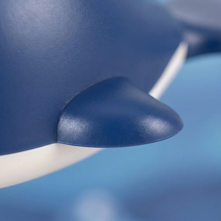 Fun wind-up floating whale bath toy set. Promotes imaginative play for toddlers, no batteries required.