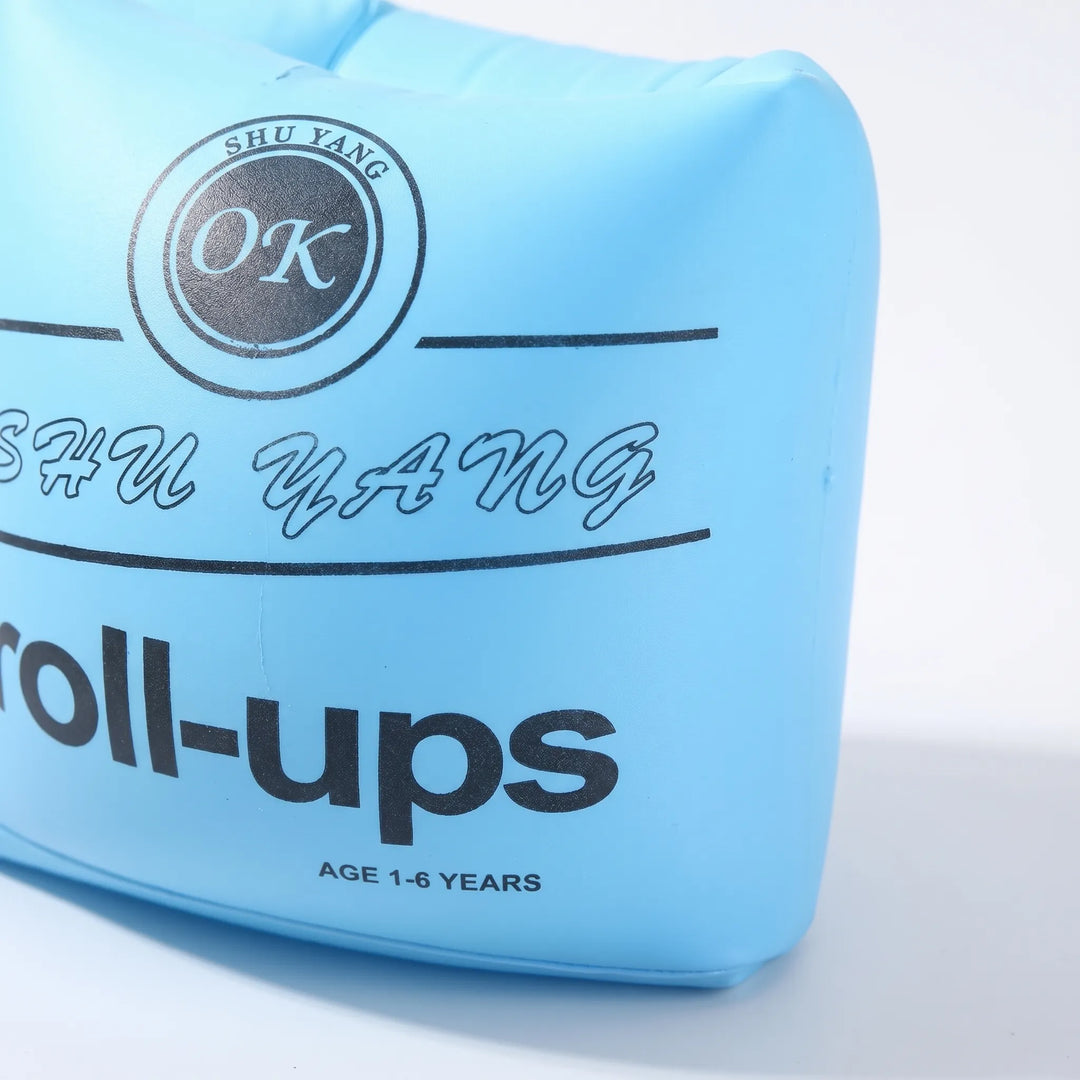 Children's swim armbands, inflatable pool floats for learning to swim safely at the beach.