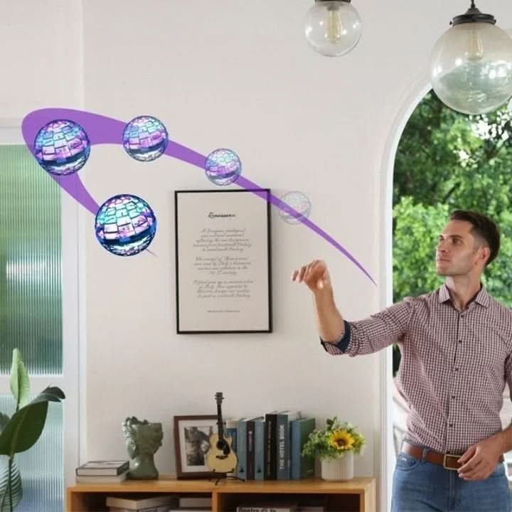 Glowing LED lights illuminate a flying UFO drone, captivating kids during interactive indoor & outdoor play.