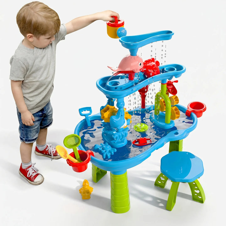 Toddlers enjoying a multi-level sensory water play table with various activity stations for engaging outdoor fun.