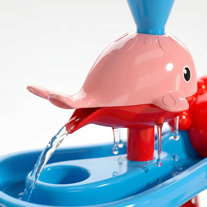 Children playing happily at a multi-level water table, perfect for stimulating sensory and creative summer outdoor fun.