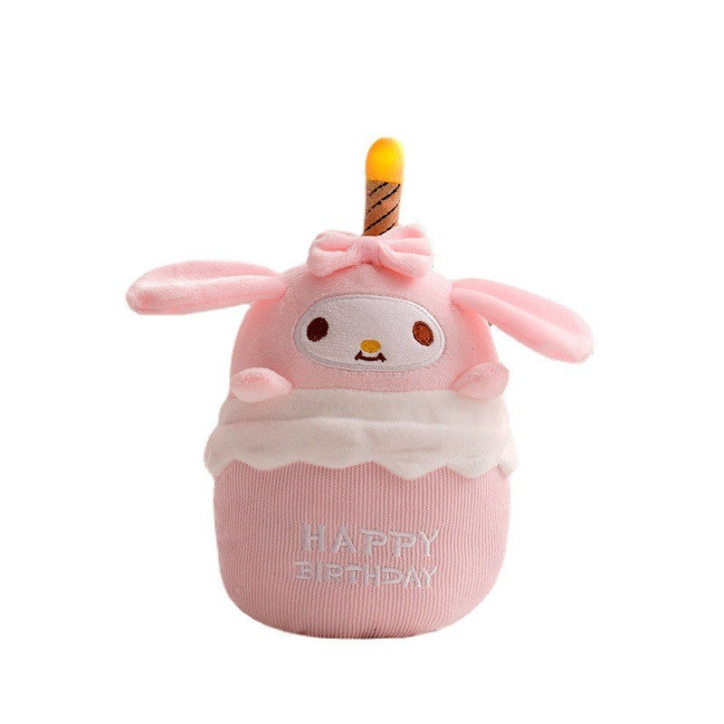 Glowing musical birthday cake plush, an adorable light-up toy and kids' gift, great for any celebration.