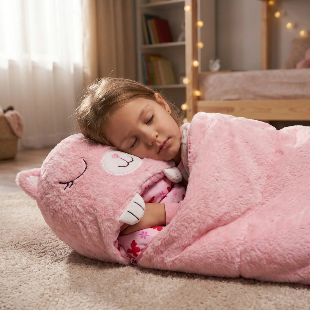 Kids' plush unicorn sleeping bag and pillow combo, perfect for cozy sleepovers.