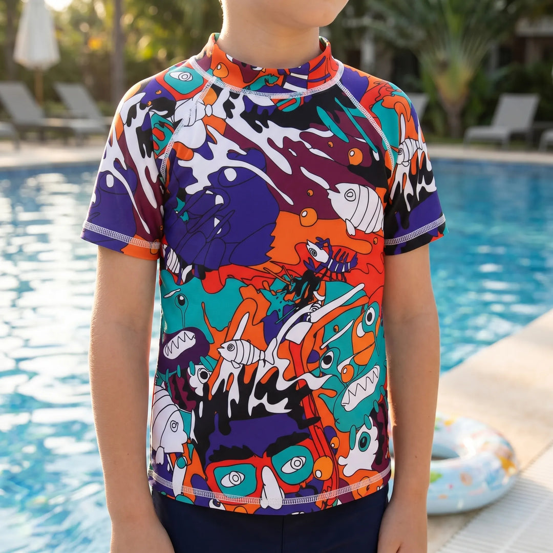 Kids' short-sleeve rash guard swim top with UPF 50+ sun protection, perfect for beach & pool wear.