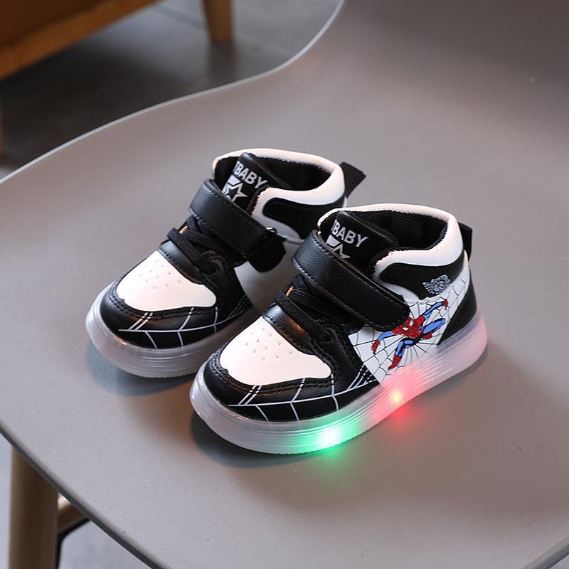 Superhero Spiderman light-up athletic sneakers for kids. Vibrant red & blue active wear shoes with flashing lights.