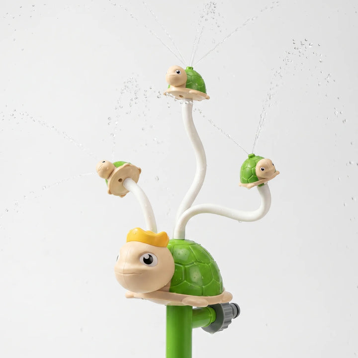 Close-up of a kids' spinning sprinkler, ideal for cooling down and making summer playtime memorable.