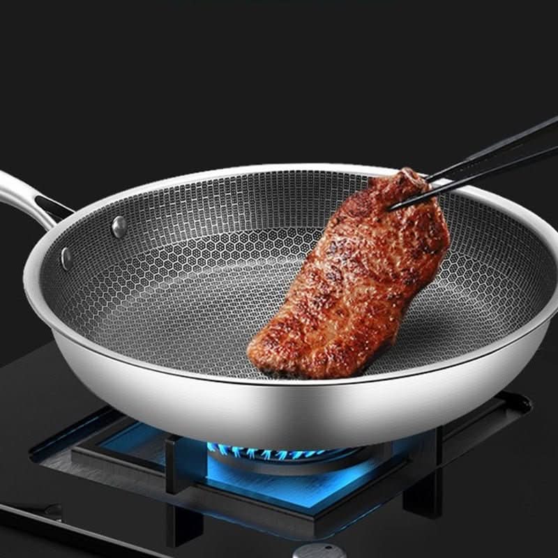 Premium stainless steel non-stick frying pan with ergonomic handle. Ideal for everyday kitchenware.
