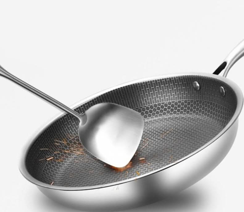 Versatile non-stick stainless steel skillet. Durable cookware for frying, sautéing, and healthy meals.