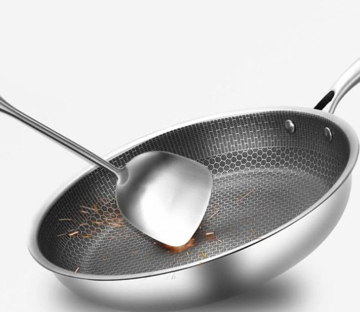 Versatile non-stick stainless steel skillet. Durable cookware for frying, sautéing, and healthy meals.