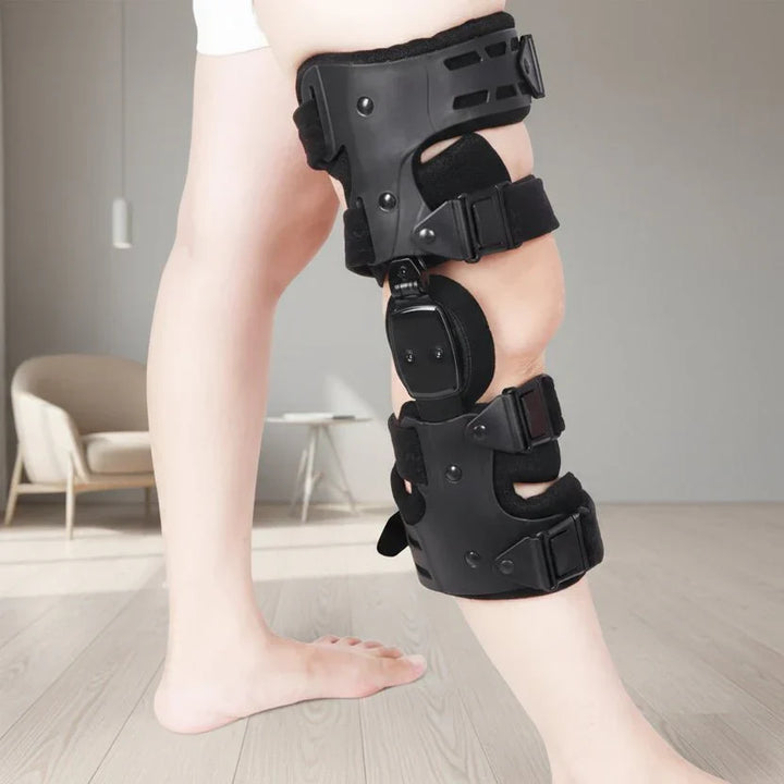 Ergonomic compression knee brace offering active support for sports injuries & rehabilitation.