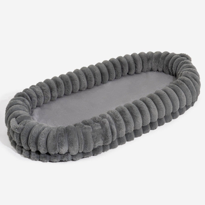 Premium indoor extra-large calming bed for pets and humans, luxurious grey faux fur donut design