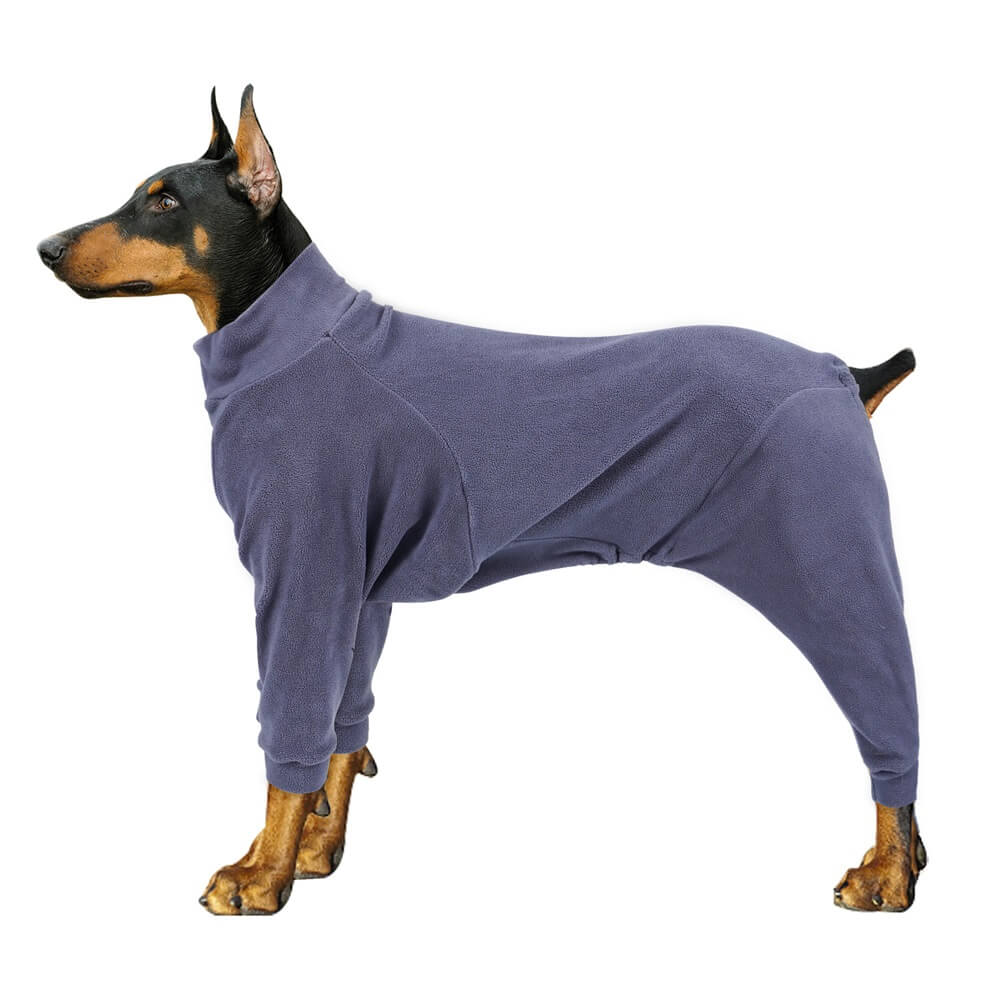 Back view of large dog wagging tail in fleece pajamas, happy and warm pet apparel