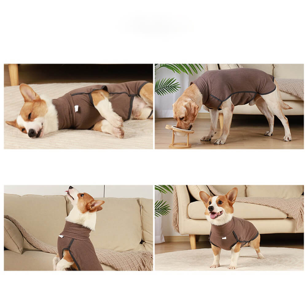 Close-up of the waterproof fabric on a blue large dog winter coat, showing stitching.