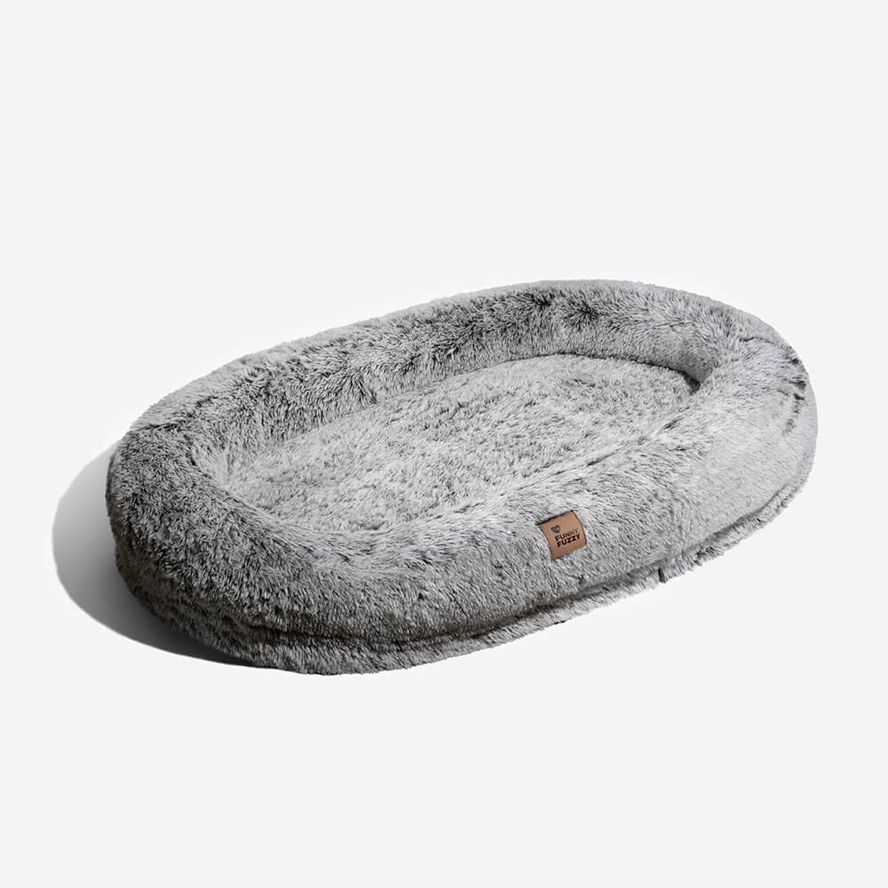 Faux fur human dog bed, promoting deep sleep for both pet and owner, washable