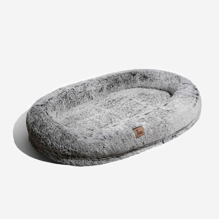 Faux fur human dog bed, promoting deep sleep for both pet and owner, washable