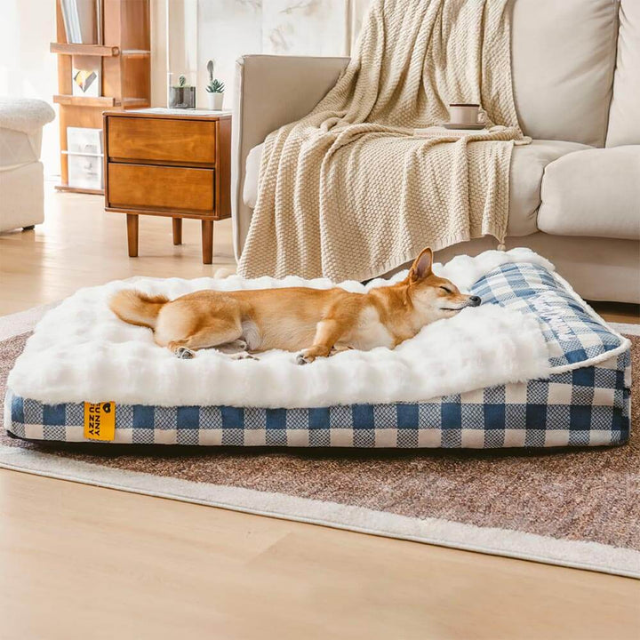 Orthopedic plaid dog bed with headrest, designed for large breeds and senior dogs' well-being