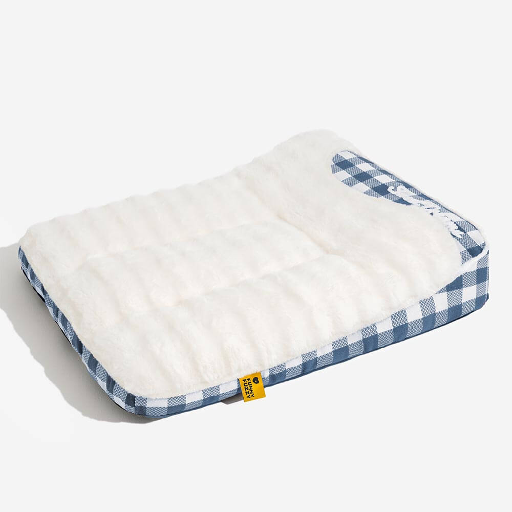 Heavy-duty plaid dog bed featuring a supportive headrest, perfect for active or large dogs