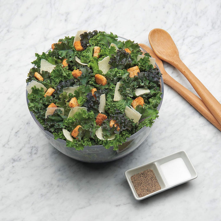 Large kitchen salad spinner for fresh greens, a durable and essential food prep tool for healthy, dry vegetables.