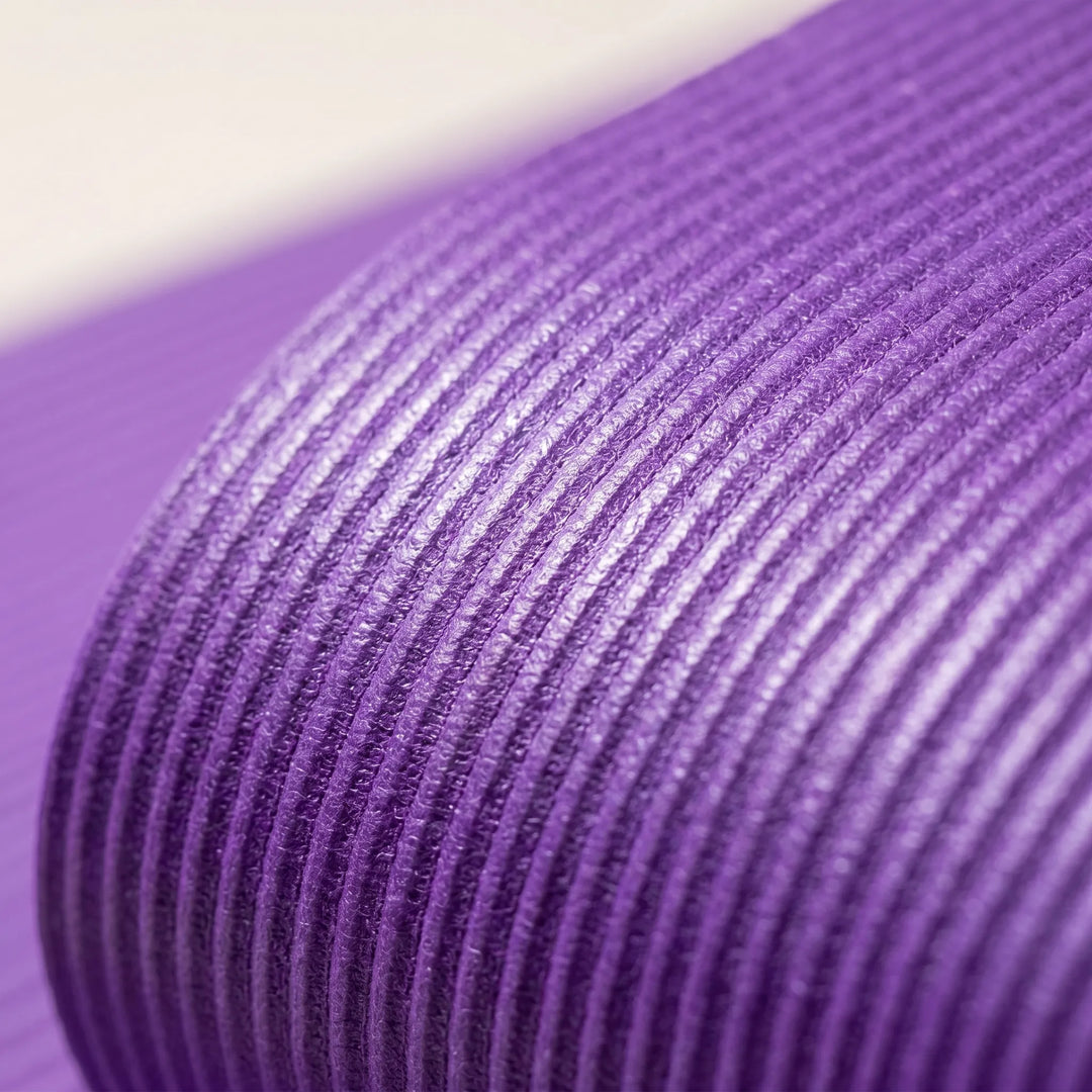 Premium pink fitness mat, extra thick & non-slip. Large exercise mat for comfortable yoga & workouts.