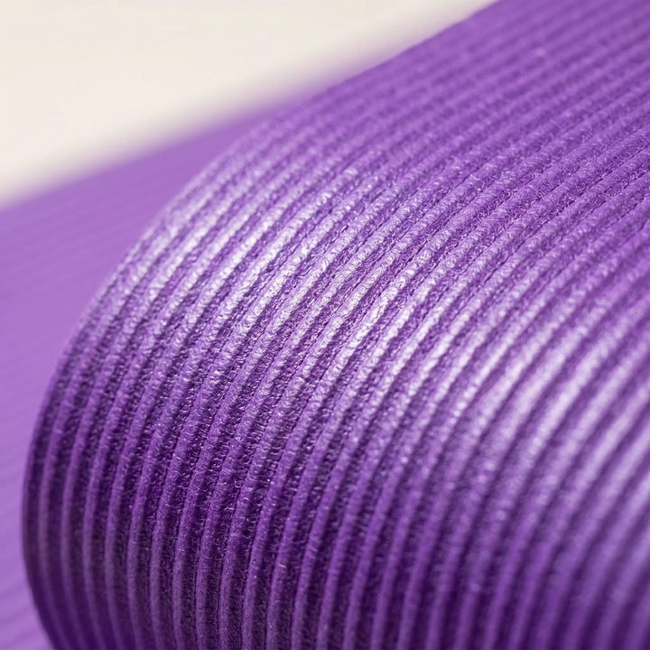 Premium pink fitness mat, extra thick & non-slip. Large exercise mat for comfortable yoga & workouts.